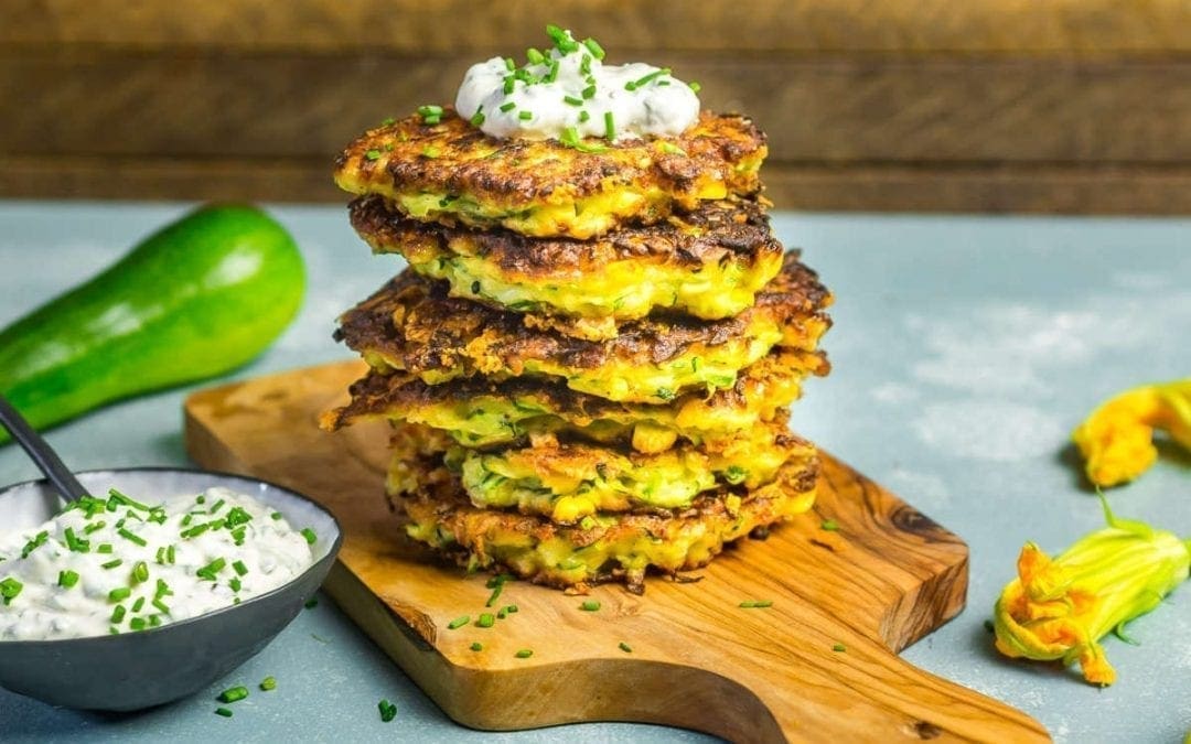 Cheesy Zucchini and Corn Fritters with Herb Sour Cream