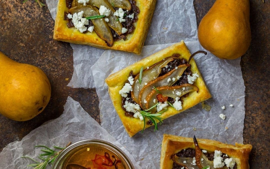 Pear & Caramelized Red Onion Tarts with Goat Cheese and Spicy Honey Drizzle